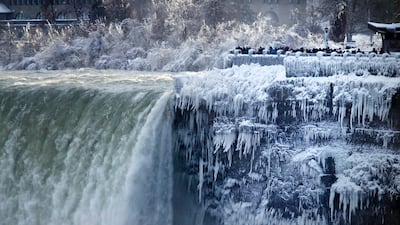 The banks around the Horseshoe Falls at Niagara Falls in Canada Ont are frozen. Aaron Lynett / The Canadian Press via AP