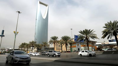 Cars drive past the Kingdom Centre Tower in Riyadh which houses the public prosecutor's office. Faisal Al Nasser / REUTERS