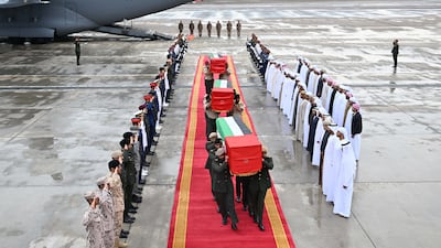 The bodies of three of the Emirati armed forces officers killed in a terrorist attack in Somalia arrive at Al Bateen Airport. A fourth officer died of his injuries after being flown back to the UAE. Wam