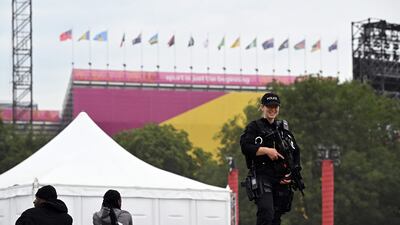 A police officer stands guard outside Alexander Stadium. AFP