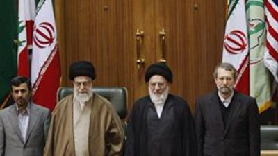 Iran's President Mahmoud Ahmadinejad, left, at a summit in Tehran in support of war-torn Gaza and the Palestinian people.