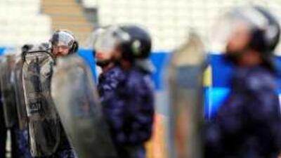A day before the start of the Club World Cup, Abu Dhabi police officers run through a security drill at Mohammed bin Zayed Stadium.