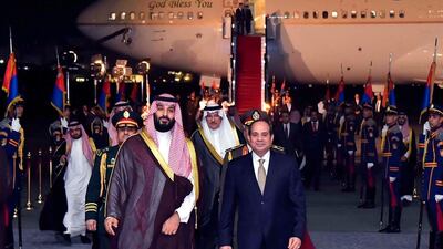 Saudi Arabia's Crown Prince Mohammed bin Salman is received bye Egyptian President Abdel-Fattah El-Sisi in Cairo. Egyptian Presidency via AP