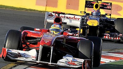 Fernando Alonso, leading Red Bull Racing's Mark Webber, is happy with Ferrari's improvement during the Australian Grand Prix.