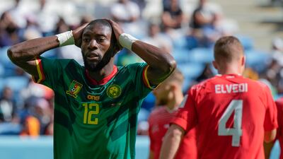 Cameroon's Karl Toko Ekambi gestures after missing a chance. AP