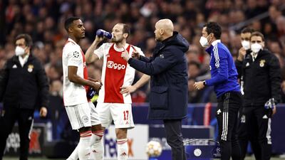 Erik ten Hag, passes on instructions to his Ajax players Ryan Gravenberch and Daley Blind during the Champions League last-16 match against Benfica at the Johan Cruijff ArenA in Amsterdam, Netherlands, 15 March 2022. EPA