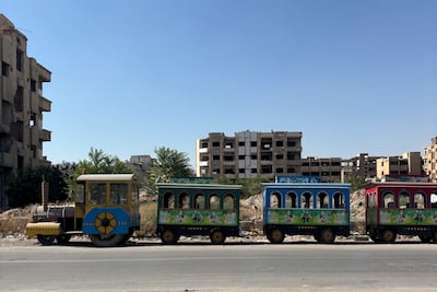 A children's train among the ruined buildings in Jobar, on the outskirts of Damascus. The National