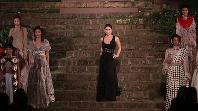 Indian Bollywood actress Kareena Kapoor Khan (C), brand ambassador for Lakme, showcases a creation by designer Anamika Khanna during the 2018 Lakme Fashion Week. AFP