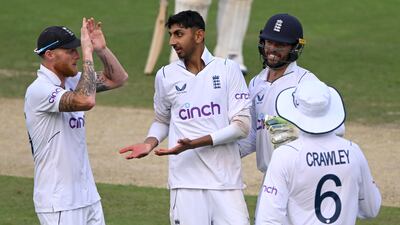 England spinner Shoaib Bashir celebrates with teammates after dismissing Axar Patel of India for 27. Getty Images