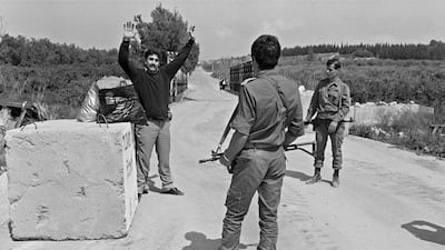Israeli Defence Force soldiers on March 19, 1985, confront a civilian at Kasmyah bridge after troops the month before evacuated about 500 sq km around Saida. AFP
