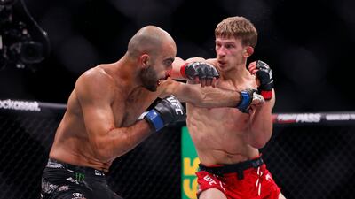 Arnold Allen, right, won a decision victory over Giga Chikadze in their featherweight bout. PA