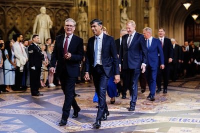 Prime Minister Sir Keir Starmer and former prime minister Rishi Sunak chat amiably on their way to the House of Lords. PA