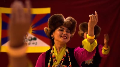 Students of The Tibetan Institute of Performing Arts perform a dance during a cultural event in Chennai. Arun Sankar / AFP