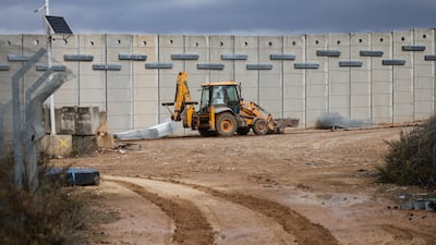 Work continues on the wall. Reuters