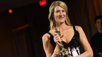Laura Dern poses with her engraved award for Best Actress in a Supporting Role for "Marriage Story" at the Governors Ball after the Oscars on Sunday, February 9, 2020, at the Dolby Theatre in Los Angeles. AFP