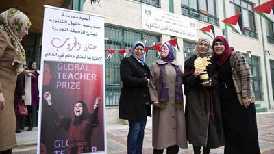 Colleagues at the Samiha Kahlil school in Al Bireh, just outside Ramallah, welcome back Hanan Al Hroub, the winner of this year’s Global Teacher Prize. Heidi Levine for The National