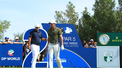 DUBAI, UNITED ARAB EMIRATES - NOVEMBER 16: Rory McIlroy of Northern Ireland and Patrick Reed of the United States look on from the 2nd tee during day two of the DP World Tour Championship at Jumeirah Golf Estates on November 16, 2018 in Dubai, United Arab Emirates. (Photo by Andrew Redington/Getty Images)