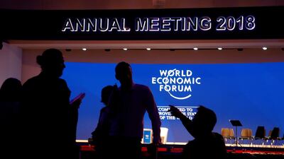 Staff talk in the Congress Hall ahead of the World Economic Forum (WEF) annual meeting in the Swiss Alps resort of Davos, Switzerland. Denis Balibouse / Reuters