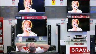 A man watches Celine Dion on high-definition TVs. The broadcaster MBC says customers are demanding more HD channels.