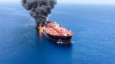Smoke billows from a tanker that has been attacked in the waters of the Gulf of Oman. AFP
