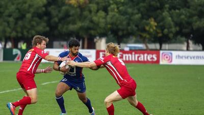 Jebel Ali Dragons, blue, pictured in action against Bahrain in January. Victor Besa for The National