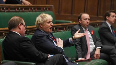 Britain's Prime Minister Boris Johnson speaks during a session on Covid-19 situation update at the House of Commons in London, Britain December 1, 2020. UK Parliament/ REUTERS