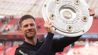 Xabi Alonso celebrates with the Meisterschale (Champions' bowl) on May 18, 2024, after winning the Bundesliga title. Getty Images