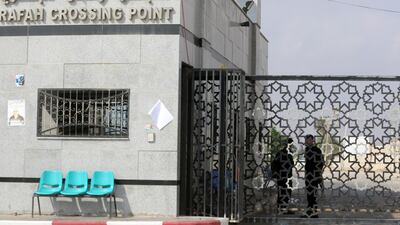 Palestinian security forces loyal to the Palestinian Authority stand at the Rafah border crossing with Egypt in the southern Gaza Strip on July 17, 2018. AFP