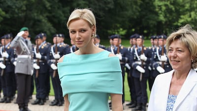 Princess Charlene, in a mint green jump suit, visits Schloss Bellevue Palace in Berlin, Germany on July 9, 2012. Getty Images