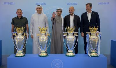 Sheikh Mansour bin Zayed, Vice President and Deputy Prime Minister and Chairman of the Presidential Court, centre, alongside Pep Guardiola, second right, during a visit to Abu Dhabi in 2024 to celebrate Manchester City's four Premier League titles in a row. Photo: UAE Presidential Court