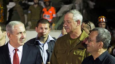 Israeli Prime Minister Benjamin Netanyahu in 2012 with Benny Gantz, second right. and Ehud Barak, Israeli defence minister at the time, right. Reuters