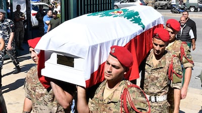 Soldiers carry the coffin of Brig Gen Wissam Sabra of the Lebanese Armed Forces at a funeral in Beirut. EPA