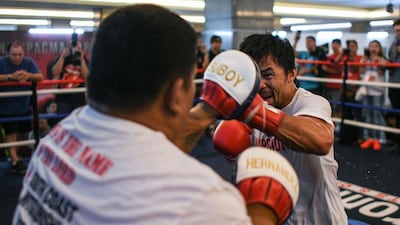 Manny Pacquiao takes part in a training session at a gym in Kuala Lumpur ahead of his WBA world welterweight bout against Argentina's Lucas Matthysse on July 15. AFP