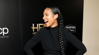 Alicia Keys poses backstage at the awards. Reuters