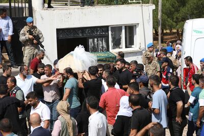 People carry the coffin of Narin Guran during her funeral in Tavsantepe village on September 9. Reuters