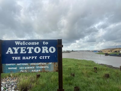 A sign welcoming visitors to the sinking 'happy' city. Abiodun Jamiu for the National