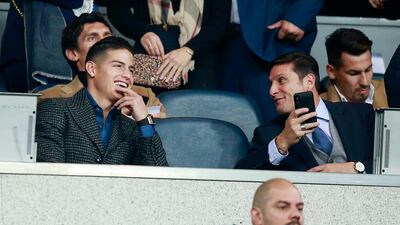 James Rodriguez (left) and Javier Zanetti look on from the stands prior to the second leg of the final match. Getty Images