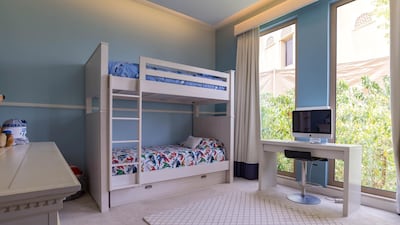 Two of the bedrooms are currently being used as children's rooms. Courtesy LuxuryProperty.com