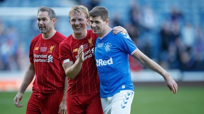 Liverpool's Dirk Kuyt (centre) and Steven Gerrard after the legends match at Ibrox Stadium, Glasgow. PA Photo. Picture date: Saturday October 12, 2019. Photo credit should read: Steve Welsh/PA Wire