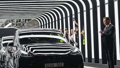 Tesla chief executive Elon Musk at the opening of the factory in Gruenheide, near Berlin, where production will be halted temporarily. AP