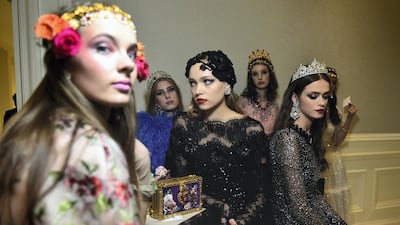 Models patiently wait for their moment in the spotlight. Courtesy Mark Ganzon