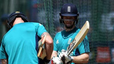 England's captain Eoin Morgan, right, talks with a teammate during training session at Feroj Shah Kotla cricket ground in New Delhi on March 21, 2016. England will play their World T20 cricket match against Afghanistan on March 23, 2016. Agency