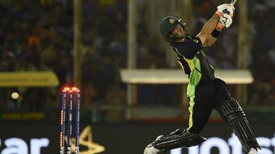Australia’s Glenn Maxwell is bowled during the World T20 cricket tournament match between India and Australia at The Punjab Cricket Stadium Association Stadium in Mohali on March 27, 2016. AFP / MONEY SHARMA