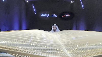 Sheikh Mohammed bin Rashid inspects the design for the main expo station, which is modelled after the wings of a plane. Wam