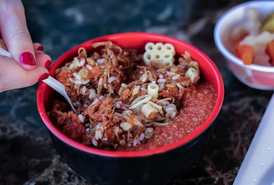 Add vinegar and chilli sauce for an extra kick to your koshari. Victor Besa / The National