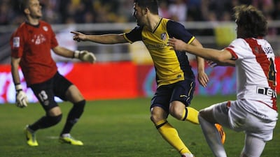 David Villa scored Atletico Madrid's opening goal on Sunday night. Juan Medina / Reuters