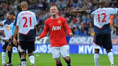 Wayne Rooney looked pretty happy after completing his second hat trick in as many games by scoring Manchester United's final goal in 5-0 blowout of Bolton.