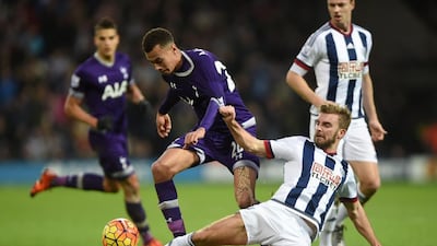 West Bromwich Albion’s James Morrison, right, and Tottenham Hotspur’s Dele Alli battle for the ball during their English Premier League soccer match at The Hawthorns, West Bromwich, England, Saturday, Dec. 5, 2015. (Joe Giddens/PA via AP)
