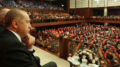 President Recep Tayyip Erdogan attends opening session of Turkey's new parliament on July 7, 2018. Presidency Press Service via AP