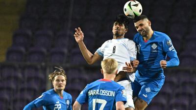 Iceland defender Victor Palsson and Israel midfielder Dor Peretz compete for a header. AFP